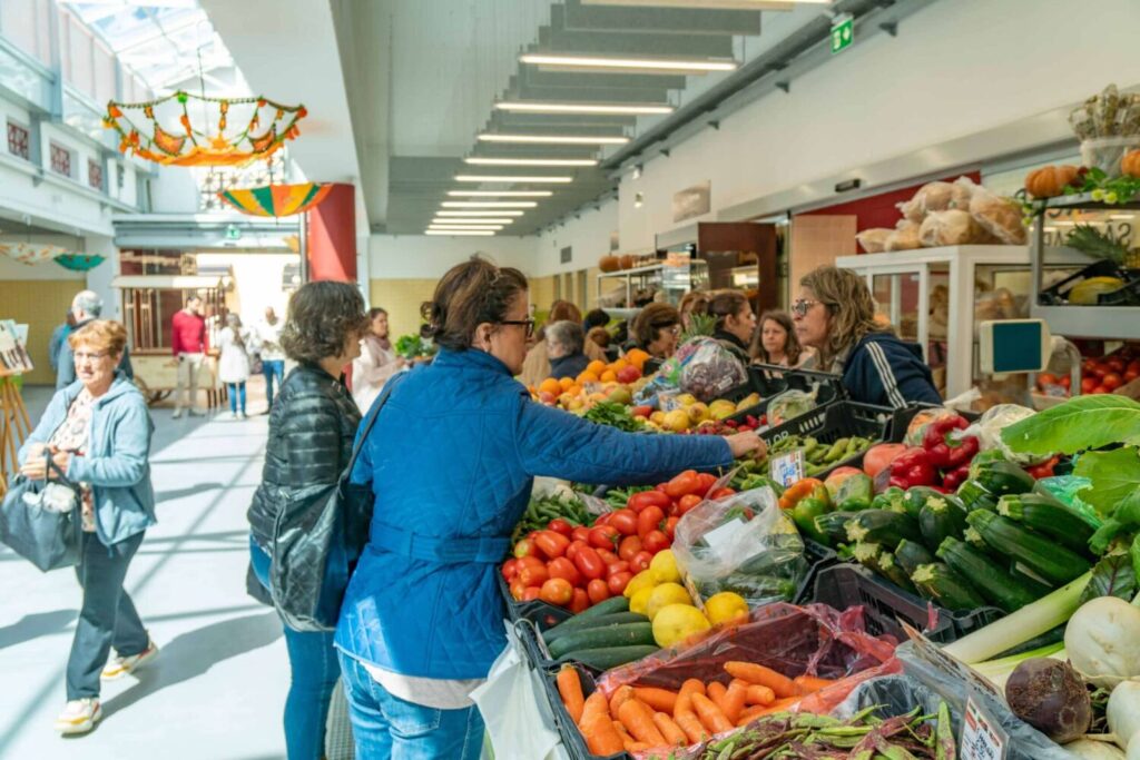 Loyal vendors and customers enjoying a lovely new environment